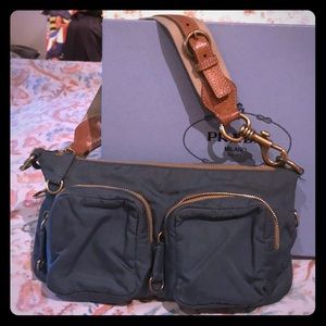 Shoulder bag Miu Miu bought are Harrod’s London,